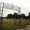 Sigel Cemetery is no Boothill because there are no hills for many miles around. This is flatland country, and in wet years the rich black soil swells and sinks, causing the heavy gravestones to heave and lean.