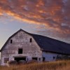 A September sunset near an old barn in Sioux Falls.
