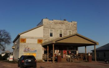 Union County citizens joined together to fix the big porch on the old Spink Store near Beresford. The store continues to serve as a restaurant.