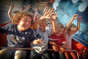 Squeals of delight punctuate the sounds of the carnival at
the South Dakota State Fair in Huron.  Photo by Chad Coppess / S.D. Tourism.