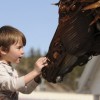 A boy marvels at “Iron Star” by John Lopez. Photo by Bernie Hunhoff. Click to enlarge photo.