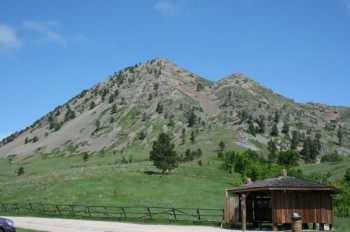 Some say Bear Butte looks like a pregnant woman reclining or a bear lying on its side. It was formed by volcanic-like forces beneath the earth's surface. Photos by Rebecca and Jeremy Johnson.