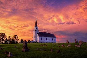 Sunset painted storm clouds over Belleview Lutheran.