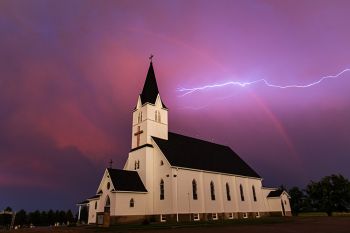 Rainbow and lightning over Immanuel Lutheran.