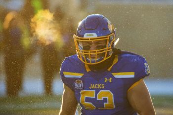 Celebration after a big defensive stop in the late afternoon sunlight in 2018.