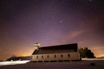 St. Boniface Idylwilde Catholic with a shooting star just above the roof.