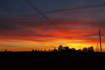 Vivid late autumn sunset colors over Zion Lutheran Church near Wall Lake.