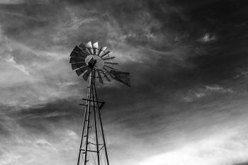 Iconic prairie windmill with a South Dakota sky in rural Lincoln County.