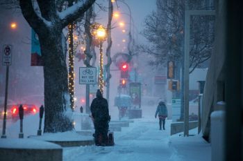 Clearing the sidewalks.