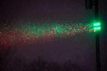 The snowfall through the spotlights looked like festive confetti.