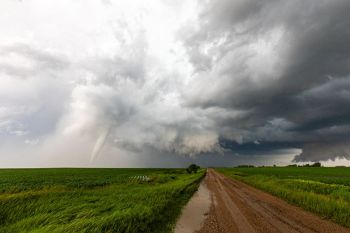 The funnel cloud begins to diminish.