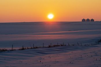 The sun setting on freshly fallen snow north of Dell Rapids.