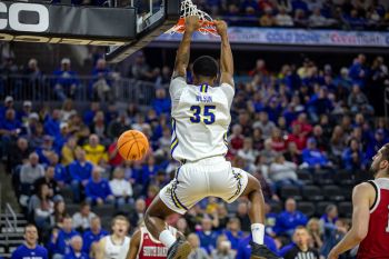 SDSU’s Douglas Wilson finishing one of his signature dunks.