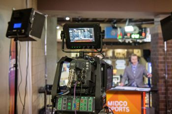 Behind the scenes look at the pre- and post-game set at the NSIC Tournament.