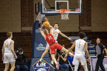 Action during the NSIC men’s championship caught in mid-air.