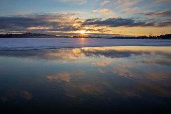 An early March sunset on the edge of Lake Vermillion.