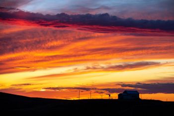 Prairie sunset over the old Brushy country school in Perkins County.