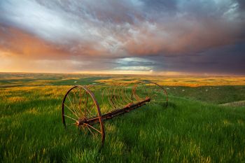 Looking east over an old hay rig in eastern Pennington County after a rain.