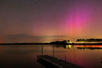 Northern lights and headlights reflected in Scott’s Slough near Hartford.