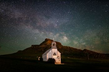 Cave Hills Lutheran Church with the Milky Way rising in Harding County.