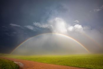 Full rainbow between Bear Butte and Sturgis.