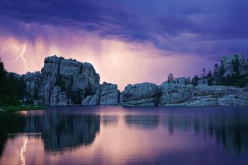 Lightning reflected in Sylvan Lake during a stay at Custer State Park in 2016 is a favorite storm photo.