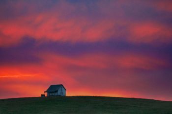 Sunset over Rabbit Butte Church of Perkins County in early July 2014.
