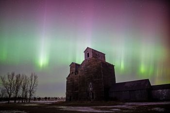 The beginning of the light show over Esmond’s grain elevators.