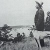 Berry with his greyhound at his side, gazing over his Badlands ranch.