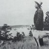 Berry with his greyhound at his side, gazing over his Badlands ranch.