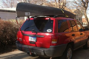 My husband's dream boat; our 'new' aluminum canoe.