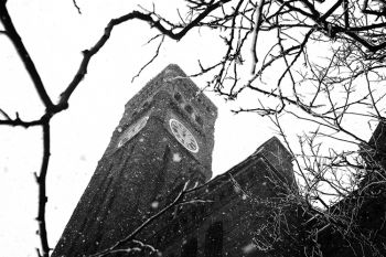 Snowfall with the Old Courthouse Museum Tower, downtown Sioux Falls.