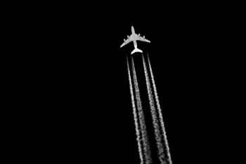 Plane with contrails northwest of Sioux Falls.