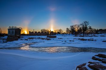 Sunrise sundogs above Falls Park in Sioux Falls.