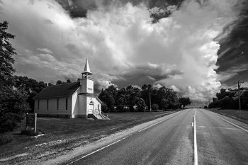 Sterling Methodist with building rain clouds in northern Brookings County.