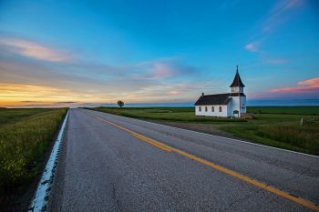 Peace Valley Church at dusk along Highway 79 in northeast Harding County.