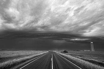 Rain threatens a farmer trying to get his spring fieldwork done in rural Beadle County.