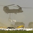 Black Hawk helicopters dropped one-ton sandbags in place at Dakota Dunes in early June. These CH-47 Chinook helicopters could carry multiple one-ton sandbags.