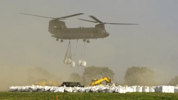 Black Hawk helicopters dropped one-ton sandbags in place at Dakota Dunes in early June. These CH-47 Chinook helicopters could carry multiple one-ton sandbags.