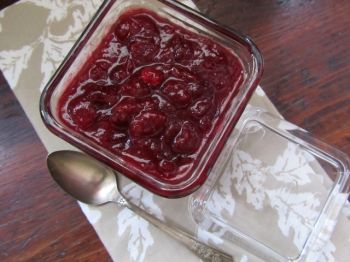 Berries, orange juice, wine, sugar and cinnamon make a delicious Thanksgiving cranberry sauce.