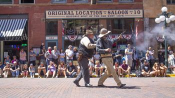 Deadwood Alive, the theater troupe behind Deadwood's historical Main Street reenactments, still draws crowds for its outdoor shootouts, though other aspects of its productions have been more noticeably affected by the pandemic.