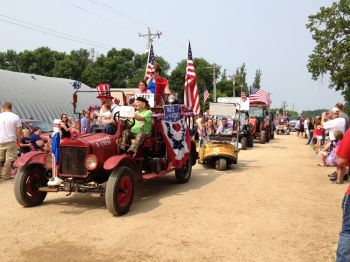 The Crouse family clown company from Watertown entertains along the parade route.