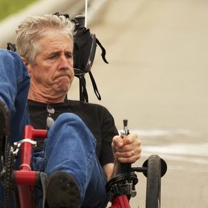 Vermillion baker Larry Smith on his recumbent bicycle.