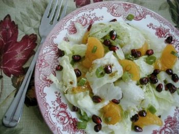 Juicy bits of pomegranate and mandarin orange combine in Fran Hill's delicious winter salad.