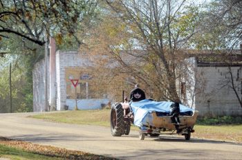 Tractors and fishing boats are nearly as common as cars and trucks in Garden City.