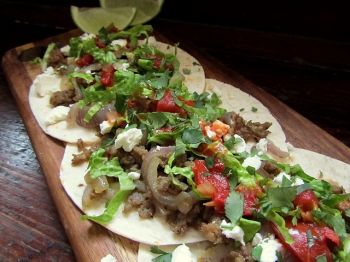 Sausage and feta tacos are a festive way to celebrate Cinco de Mayo.